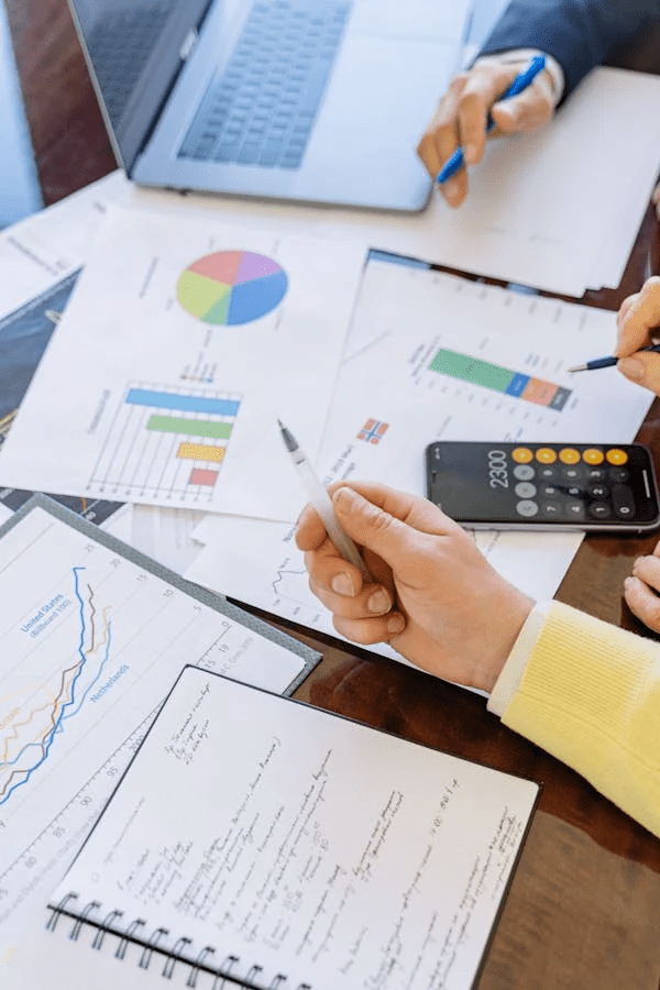 Graphs and data on paper documents representing branding research